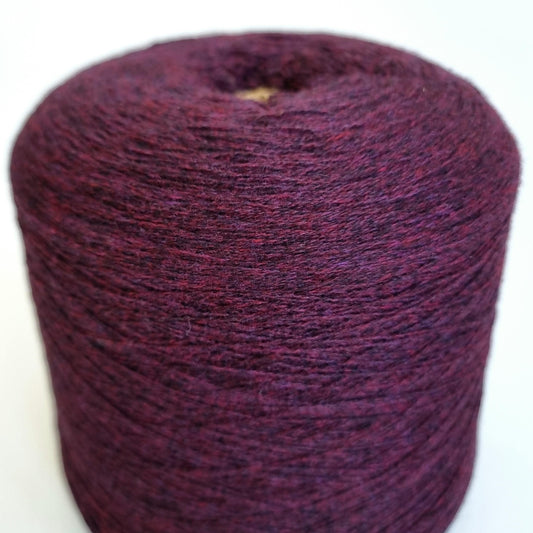 Purple yarn ball on a white background