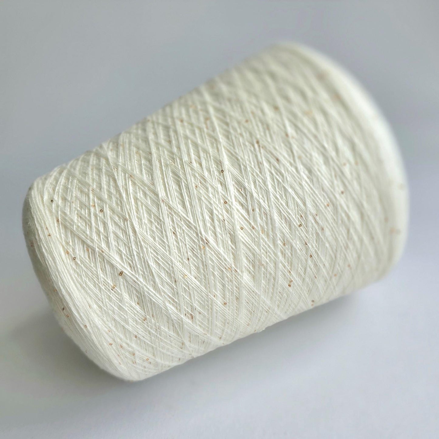White + Rose Gold sequins - 100% Extra-Fine Merino  2/60Nm - 3000m per 100g