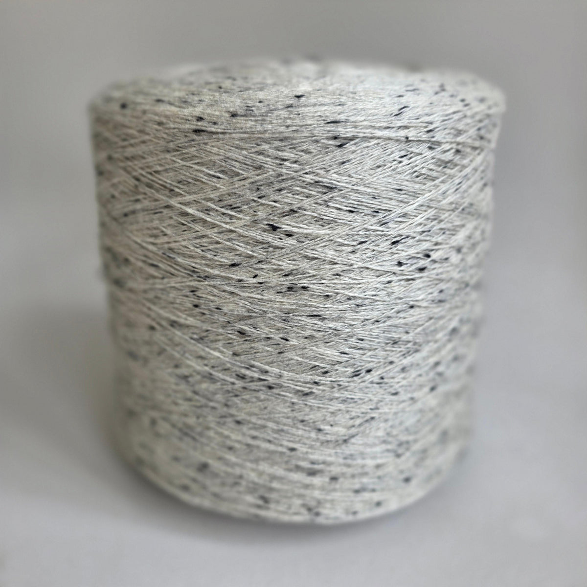 White with Black Tweed 50/20/30 Merino Wool/Cashmere/Anti-Pilling Knitting Yarn - 2/24Nm - 1200m per 100g - Angle 4