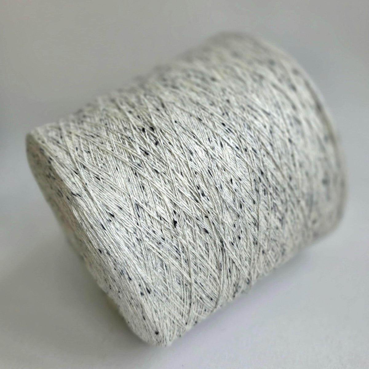 White with Black Tweed 50/20/30 Merino Wool/Cashmere/Anti-Pilling Knitting Yarn - 2/24Nm - 1200m per 100g - Detail Close-up