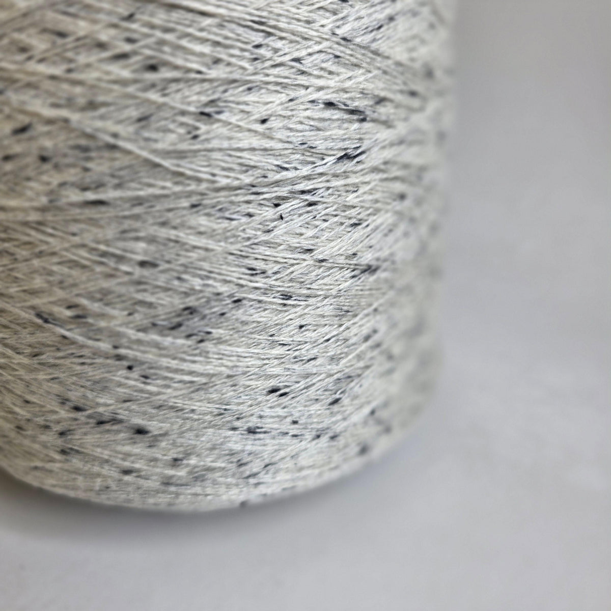 White with Black Tweed 50/20/30 Merino Wool/Cashmere/Anti-Pilling Knitting Yarn - 2/24Nm - 1200m per 100g - Front View